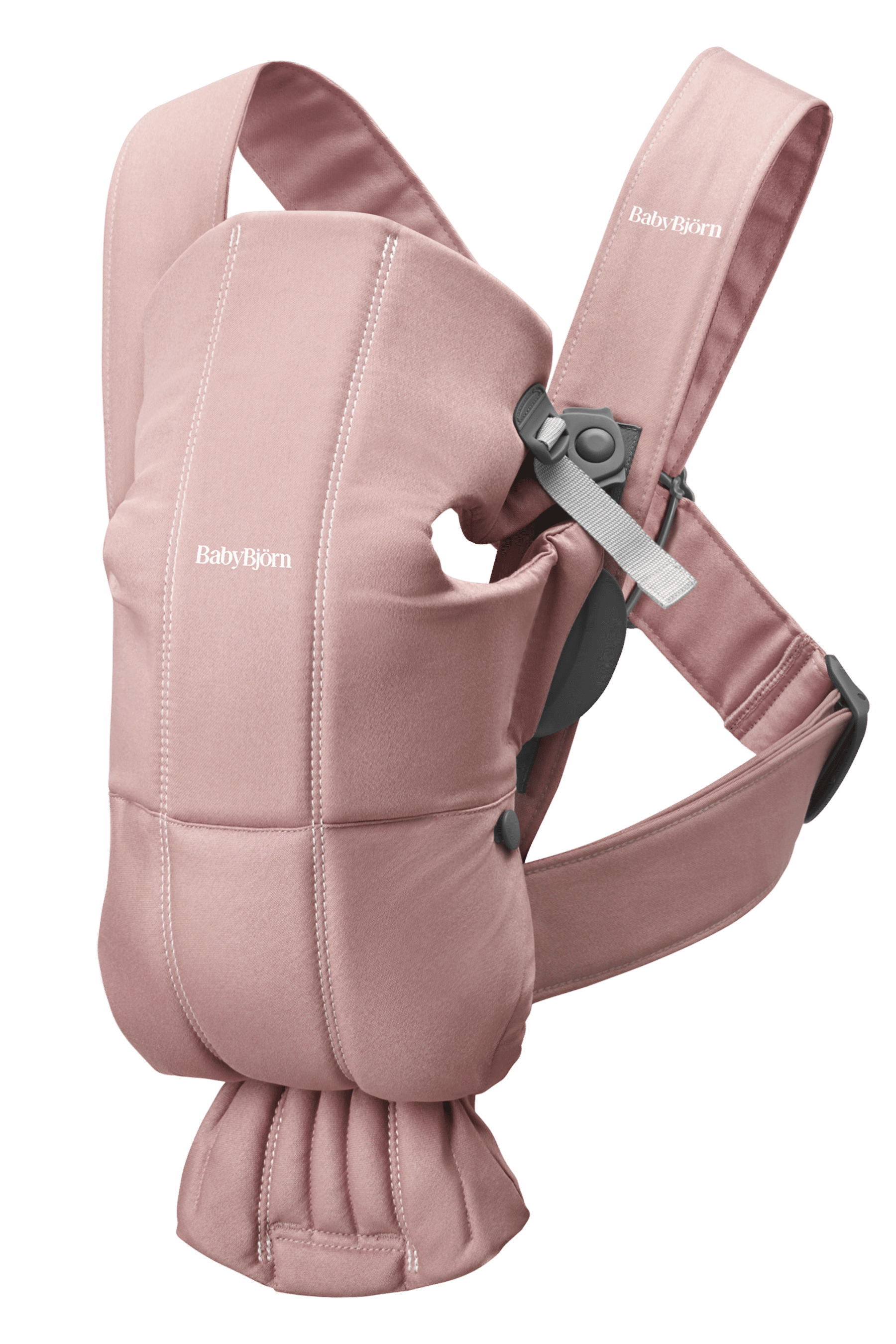 Pink BabyBjörn baby carrier with adjustable straps and ergonomic design, featuring a soft fabric and secure buckle closure.